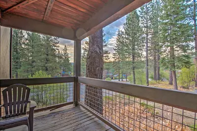 a screened porch with a view of the woods at Northstar Resort Shuttle Access Truckee Condo in Truckee