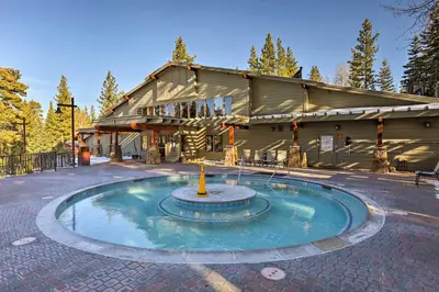 a small fountain in front of a building at Family-Friendly Truckee Cabin Near Ski Shuttle! in Truckee