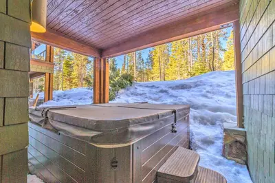 a screened in porch with snow on the ground at Central Mammoth Lakes Townhome about 1 Mi to Slopes in Mammoth Lakes