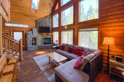 a living room with a couch and a fireplace at Hot Tub, Indoor Pool! Home 8 Mi to Heavenly Skiing in South Lake Tahoe