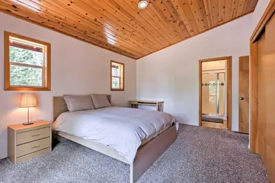 a bedroom with a bed and a wooden ceiling at Family Tahoe Donner Retreat Less Than 2 Mi to Downhill Ski in Truckee
