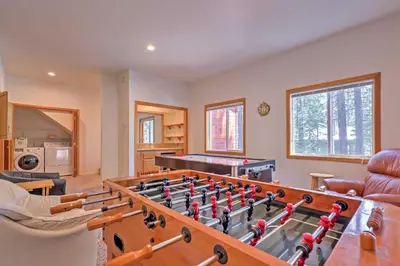 a living room with a ping pong table at Family Tahoe Donner Retreat Less Than 2 Mi to Downhill Ski in Truckee