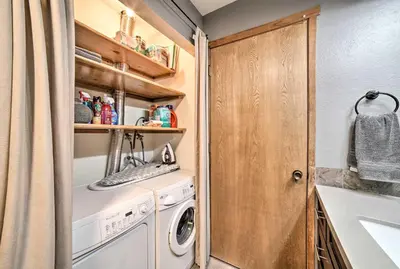 a laundry room with a washer and dryer at Renovated Mammoth Lakes Retreat with Private Balcony in Mammoth Lakes