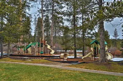a playground in a park with a slide at Cabin Less Than 2 Mi to Tahoe Donner Downhill Ski Resort in Truckee