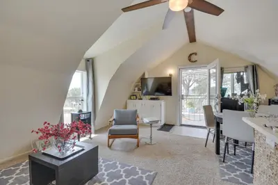 a living room with a ceiling fan and a table at Mariposa Home Furnished Patio and Sierra Mtn Views in Mariposa