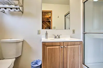 a bathroom with a sink and a toilet at Cozy Home with Patio Near Yosemite National Park! in Mariposa