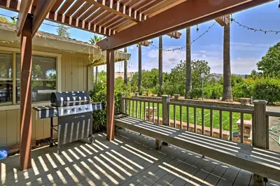 a patio with a bench and a grill at Remodeled and Cozy Gilroy Guest House Near Downtown! in Gilroy