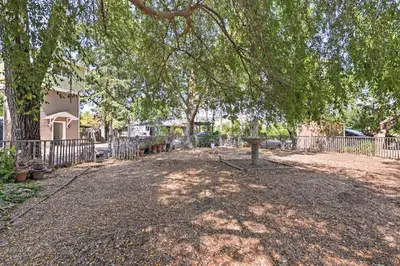 a park with a picnic table under a tree at Remodeled and Cozy Gilroy Guest House Near Downtown! in Gilroy