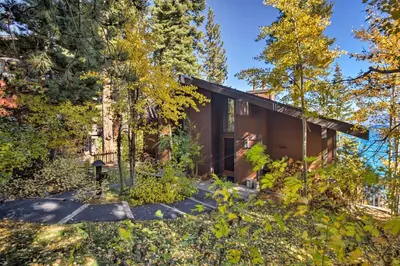 a house in the woods with trees at 11 Mi to Palisades Tahoe Lakefront Home with View! in Tahoe City