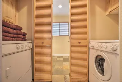 a laundry room with a washer and dryer at Mammoth Lakes Townhome - 10-Min Walk to Village! in Mammoth Lakes