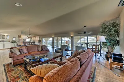a living room with couches and a table at Working Vineyard and Private Pool Villa in Plymouth in Plymouth