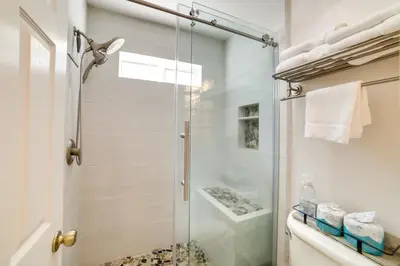 a shower with a glass door in a bathroom at Quiet Condo with Great Views, half Mi to Eagle Lodge! in Mammoth Lakes