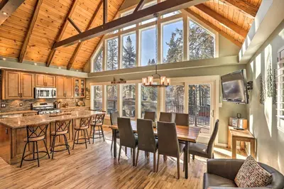 an open kitchen and dining room with a table and chairs at Close to Donner Lake and Skiing Truckee Getaway in Truckee