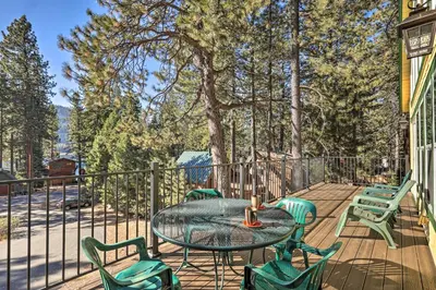 a patio with a table and chairs on a deck at Close to Donner Lake and Skiing Truckee Getaway in Truckee