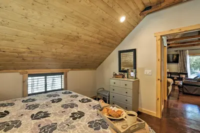 a bedroom with a bed and a wooden ceiling at 5 Mi to Skiing! Family Getaway Near Donner Lake in Truckee