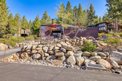 a pile of rocks in front of a house at 1 Mi to Lake Tahoe Home with Hot Tub and Decks in Tahoe City