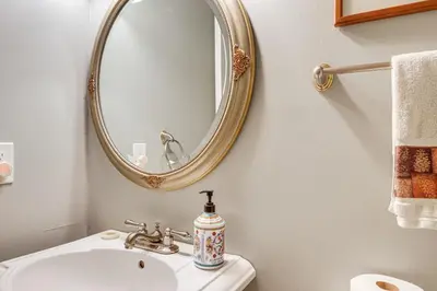 a bathroom with a sink and a mirror at 1 Mi to Diamond Peak Ski Resort Forest-View Condo in Incline Village