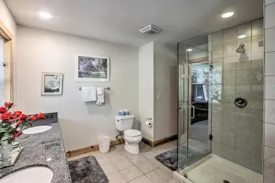a bathroom with a glass shower and a toilet at Carnelian Bay Home with Hot Tub Near Tahoe Skiing in Carnelian Bay