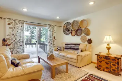 a living room with two couches and a table at 7 Mi to Northstar Resort Tahoe Vista Family Cabin in Tahoe Vista