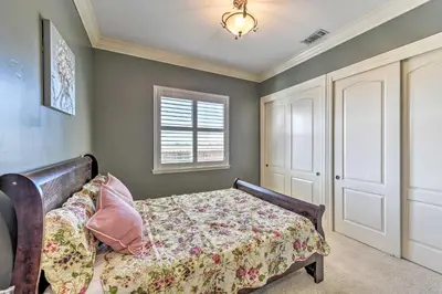 a bedroom with a bed and a window at Near Wineries Elk Grove Getaway with Saltwater Pool in Elk Grove
