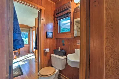 a bathroom with a toilet and a sink at Hot Tub and Lake Tahoe Views Kings Beach Lodge in Kings Beach