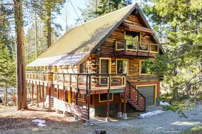 a cabin in the woods with a gambrel roof at Sequoia Forest Remote Retreat! Dreamtime Cabin in Ponderosa