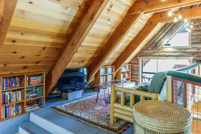 a cabin with wooden ceilings and a living room at Sequoia Forest Remote Retreat! Dreamtime Cabin in Ponderosa