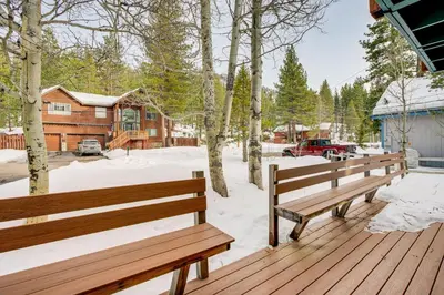 a couple of benches sitting on a deck in the snow at 11 Mi to Ski Resorts! Lake Tahoe Gem with Pool Table in South Lake Tahoe