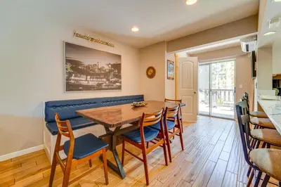 a kitchen and dining room with a wooden table and chairs at Incline Village Retreat Near Skiing and Beaches in Incline Village