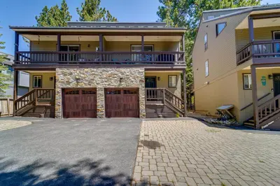 an exterior view of a house with a large driveway at Incline Village Retreat Near Skiing and Beaches in Incline Village