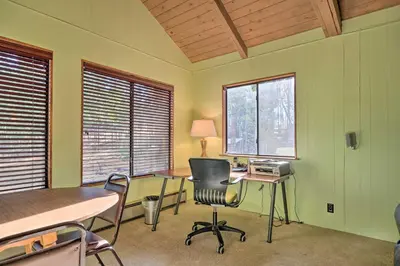 a room with a desk and chairs and windows at 6 Mi to Yosemite Natl Park 14-Acre Retreat! in Groveland