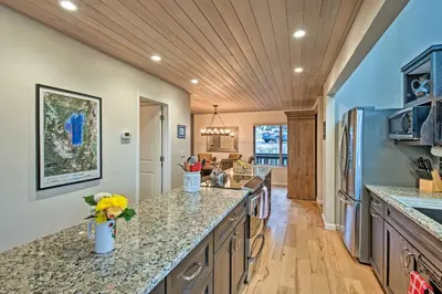 a kitchen with a counter top and a refrigerator at 2 Mi to Heavenly Mountain Tahoe Retreat with Views in Stateline