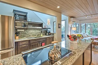 a kitchen with a sink and a counter top at 2 Mi to Heavenly Mountain Tahoe Retreat with Views in Stateline