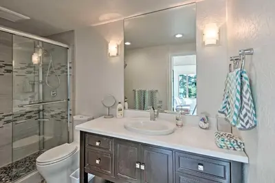 a bathroom with a sink and a toilet and a shower at 2 Mi to Heavenly Mountain Tahoe Retreat with Views in Stateline