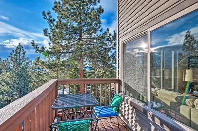 a balcony with a table and chairs on it at 2 Mi to Heavenly Mountain Tahoe Retreat with Views in Stateline