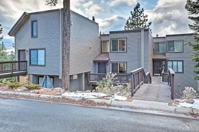a house with a wooden walkway in front of it at 2 Mi to Heavenly Mountain Tahoe Retreat with Views in Stateline