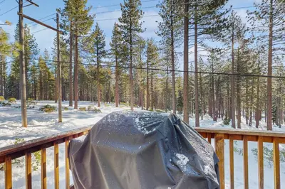 a pile of snow sitting on a wooden deck at Skyline Serenity in South Lake Tahoe