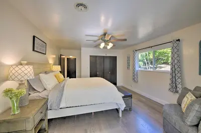 a bedroom with a bed and a ceiling fan at Wine Lovers Garden Oasis in Sutter Creek! in Sutter Creek
