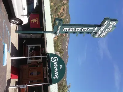 a sign for a morocco restaurant on the side of a building at The Gateway Restaurant & Lodge in Three Rivers
