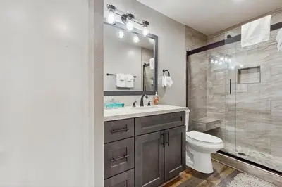 a bathroom with a sink and a toilet and a shower at St. Moritz 13 in Mammoth Lakes