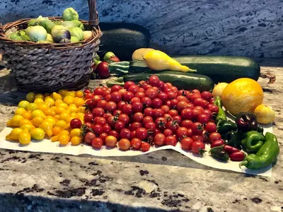 a tray of fruits and vegetables on a table at Amazing Loft on Horse Ranch in Pilot Hill