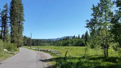 a dirt road with a row of benches in a field at Marriott Grand Res Q4 #4256 in South Lake Tahoe