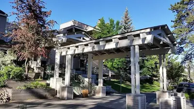 a building with a white canopy in front of it at Lakeland Village #105 in South Lake Tahoe