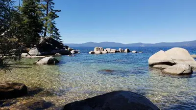 a body of water with rocks in the water at Marriott Grand Res Q3 #2241 in South Lake Tahoe