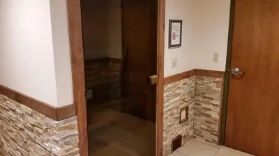 a glass door to a shower in a room at Lakeland Village #110 in South Lake Tahoe