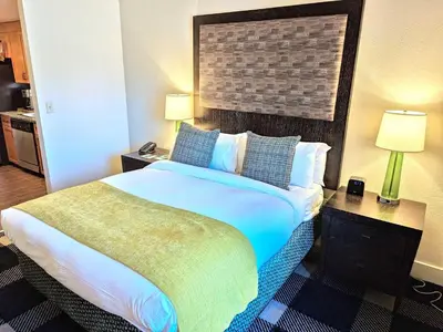 a hotel room with a large bed and two lamps at Marriott Grand Res Q1 #3256 in South Lake Tahoe