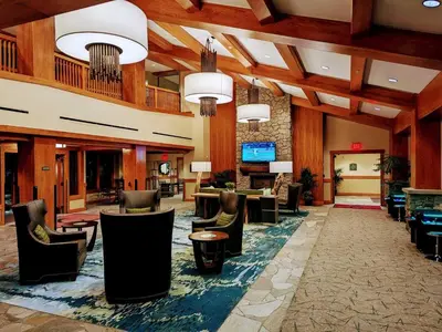 a lobby of a hotel with chairs and tables at Marriott Grand Res Q2 #3167 in South Lake Tahoe