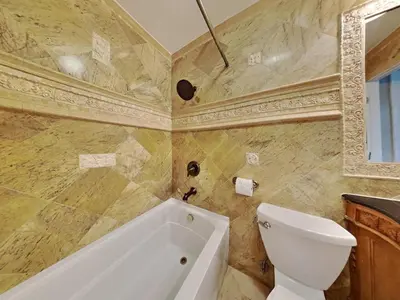 a bathroom with a toilet and a bath tub at 623 home in Mammoth Lakes