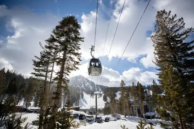 a ski lift going up a snowy mountain at 623 home in Mammoth Lakes