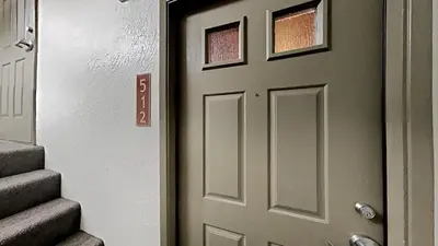 a door that is next to some stairs at Comfy 2-Bedroom Home with Pool in Mammoth Lakes